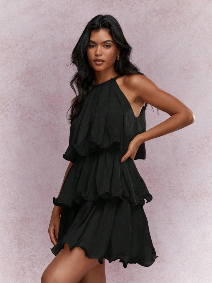 Strapless Sleeveless Sheer Dress With Ruffled Hem And Elegant Design