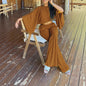 Solid-color Off-shoulder Top With An Asymmetrical Neckline, Paired With Elastic-waist Pants Featuring Pockets